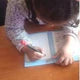 files/avis-client-9-enfant-ecrit-sur-cahier.webp